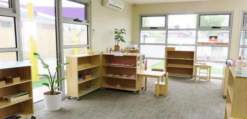 Buffalo Campus classroom with plants and open shelving