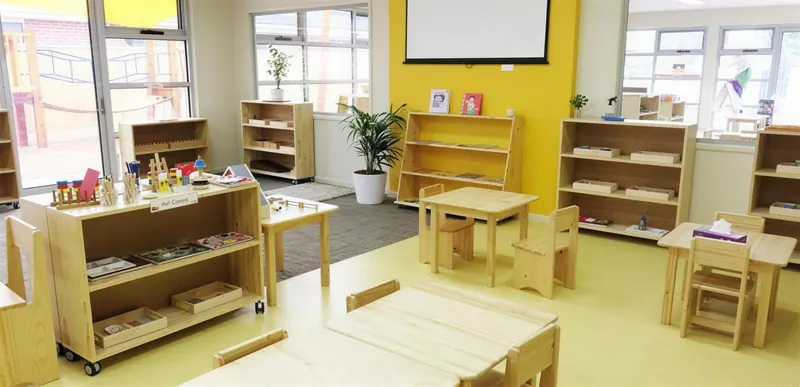 Buffalo Campus kindergarten room with learning materials on low shelves