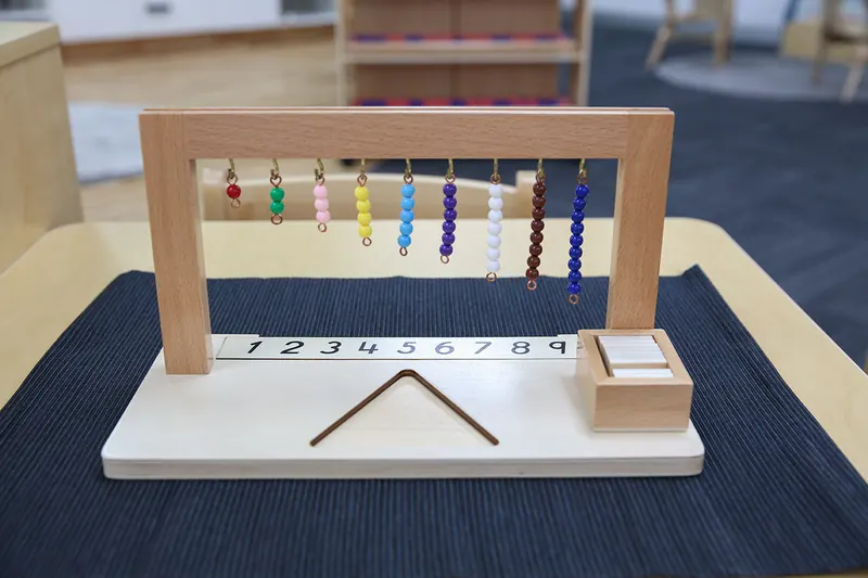 Montessori coloured bead hanger for learning numbers one to nine