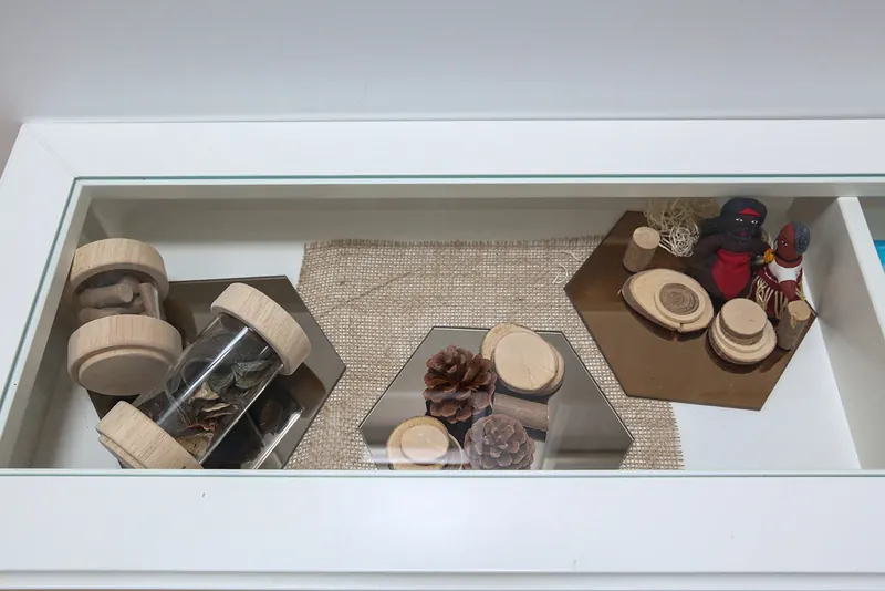 Treasure tray of natural wooden objects for sensory exploration